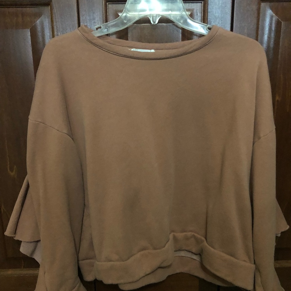 sweatshirt with open tie sleeve with ruffle